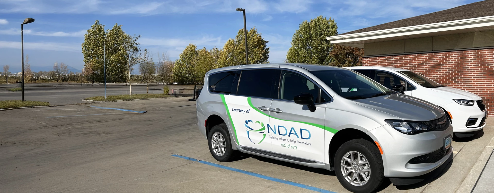 vans outside of Grand Forks office