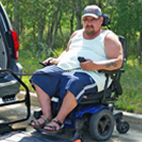 John Patterson of Mandan poses near his van in 2015.